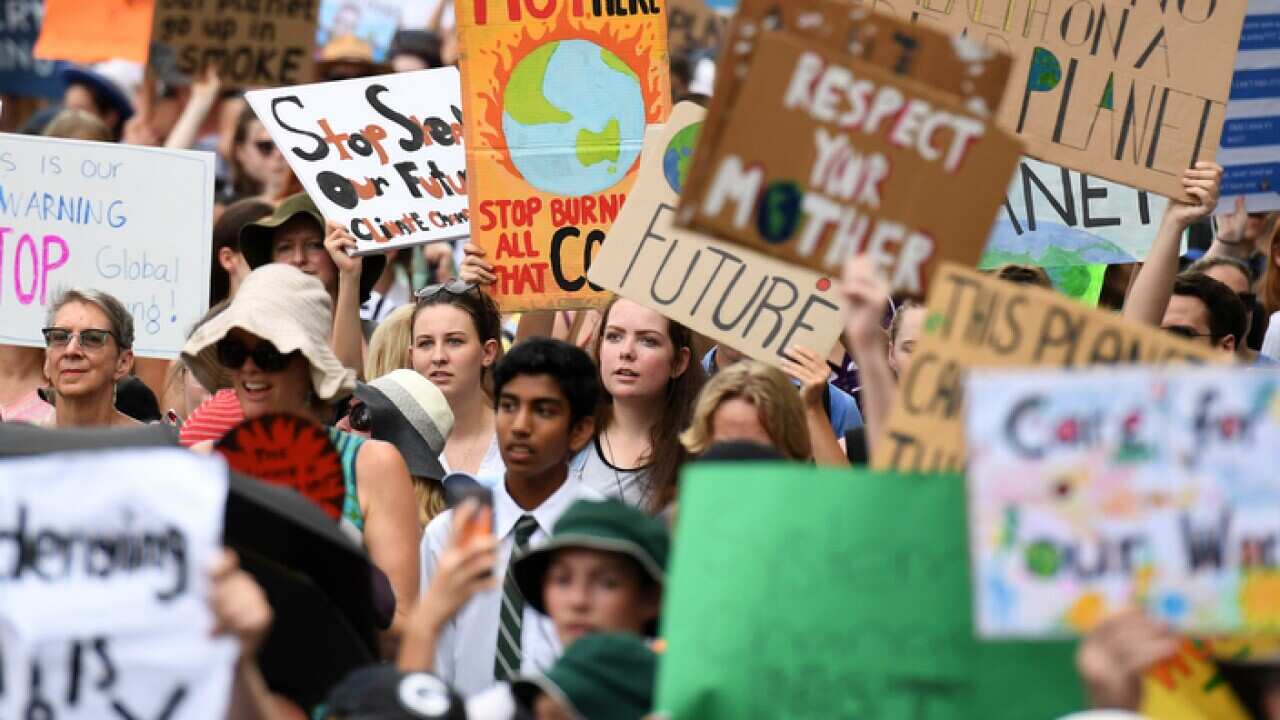 School students take part in a climate change strike in Brisbane
