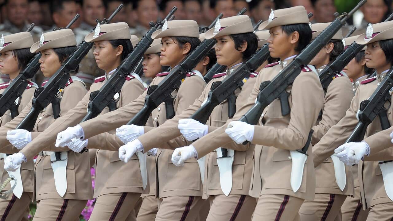Thai women police officers parade at the Royal Police Cadet Academy.