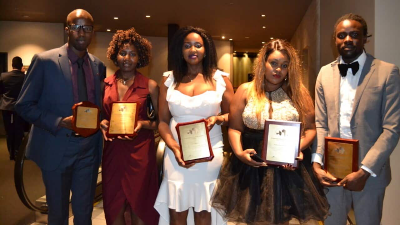 Baadhi ya wanachama wa KISWA wakiwa na tuzo katika moja ya matukio ya mwaka