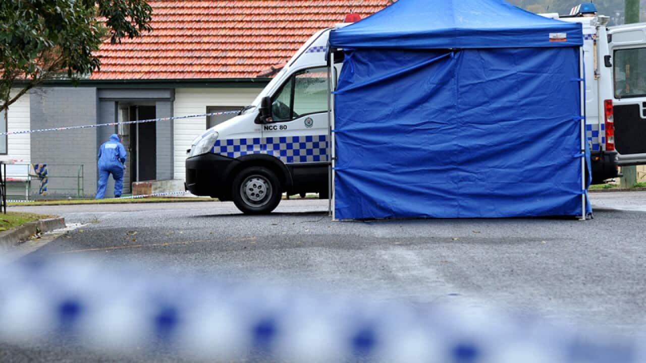 Forensic team near a home where a baby was found dead in NSW