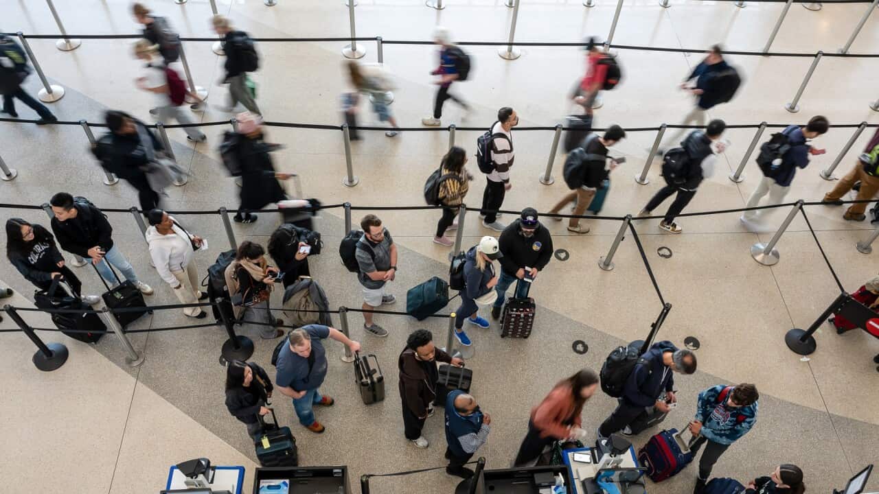 Travelers At SFO Airport Ahead Of Thanksgiving Holiday