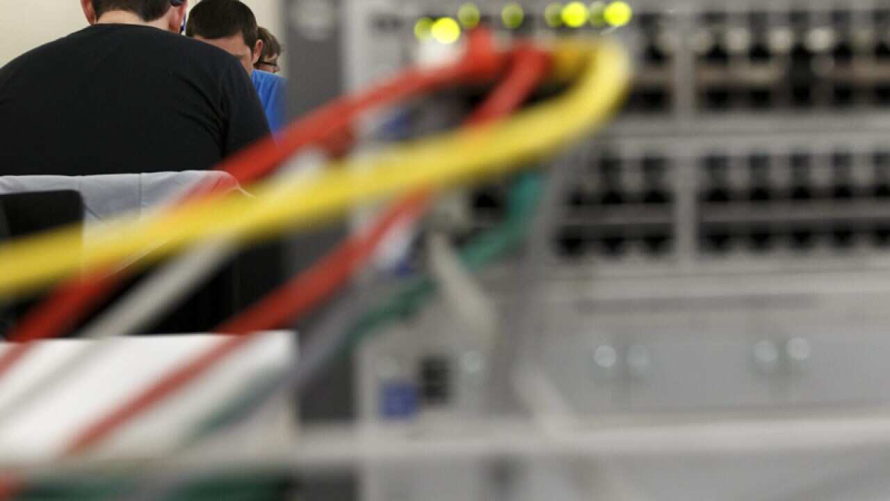 Hackers breaking the security challenges in a hacking contest, Geneva