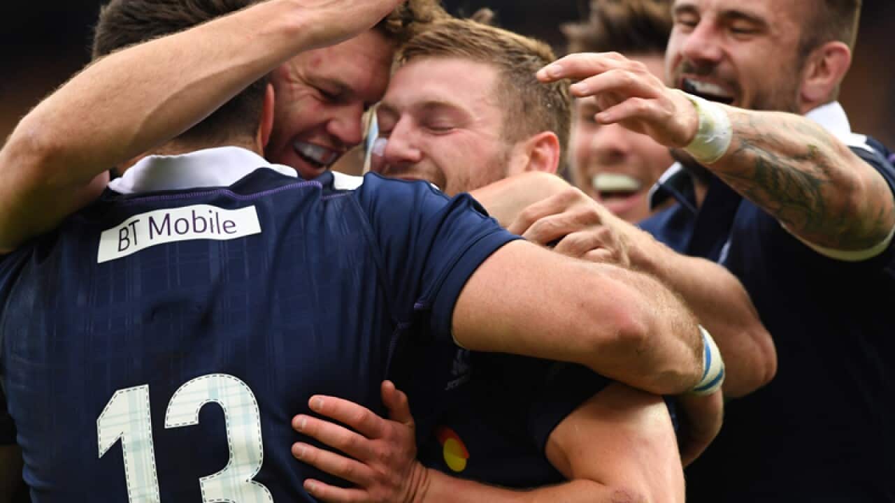 Scotland celebrate Finn Russell's (centre)