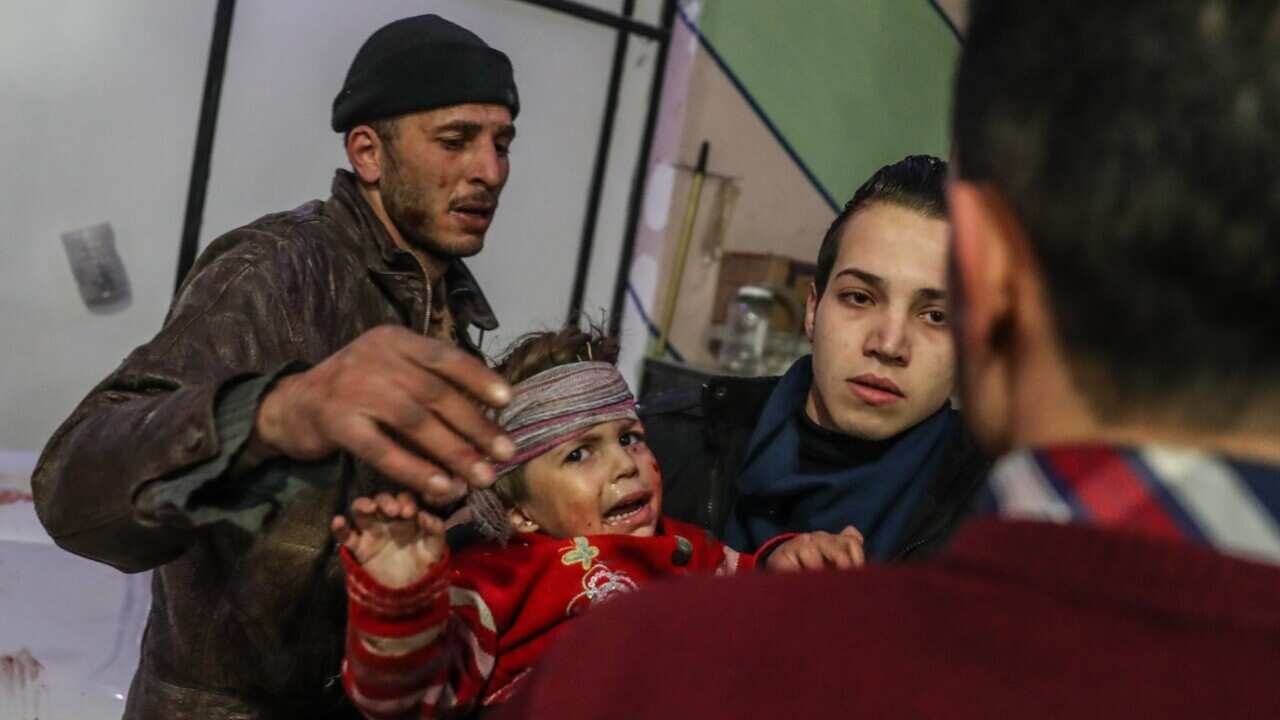 Injured children are treated at a hospital in rebel-held Douma, Eastern Ghouta, Syria, 19 February 2018. 