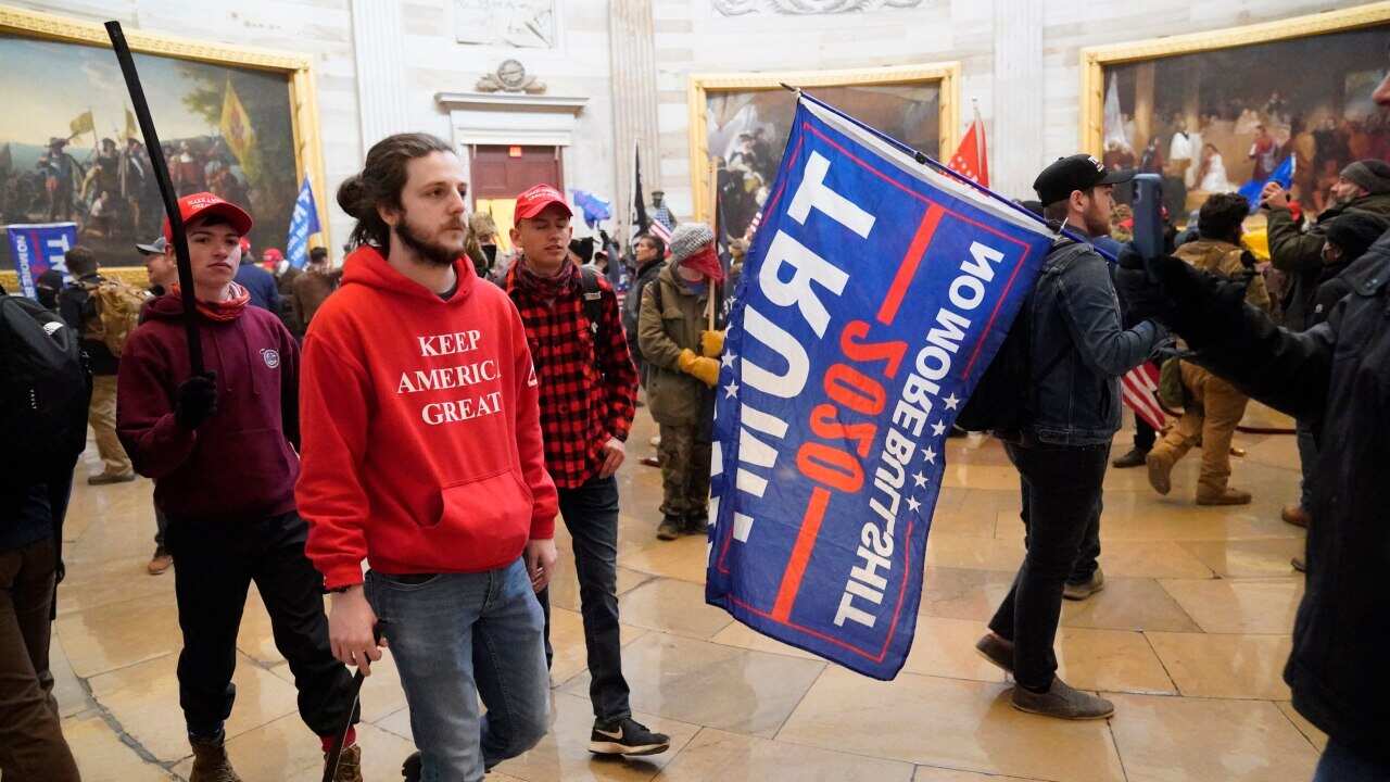 Protestors storm the Capitol building during a joint session of Congress in Washington, DC on Wednesday, January 6, 2021.