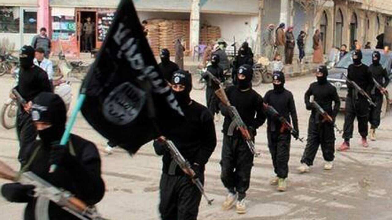 ISIL jihadists marching in Syria