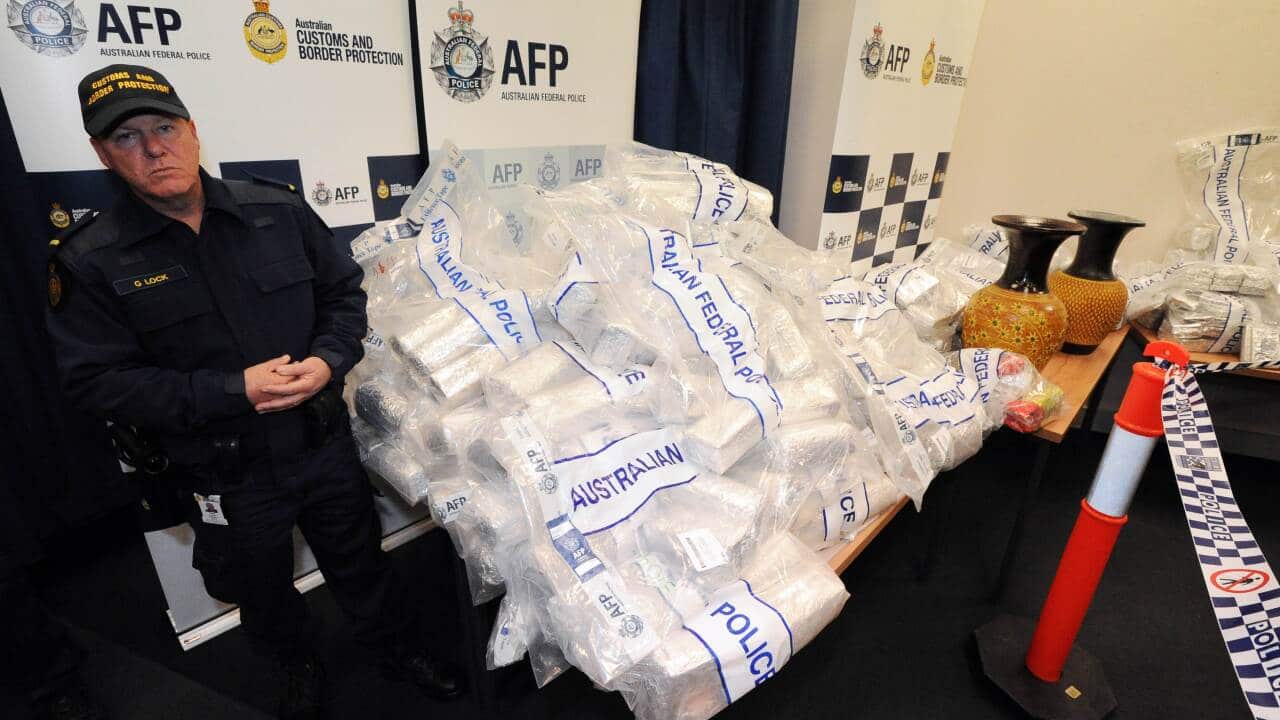 Australian Federal Police (AFP) guard 525 million USD worth of crystal methamphetamine ('ice') and heroin after smashing a Hong Kong-based international drugs syndicate (AAP)
