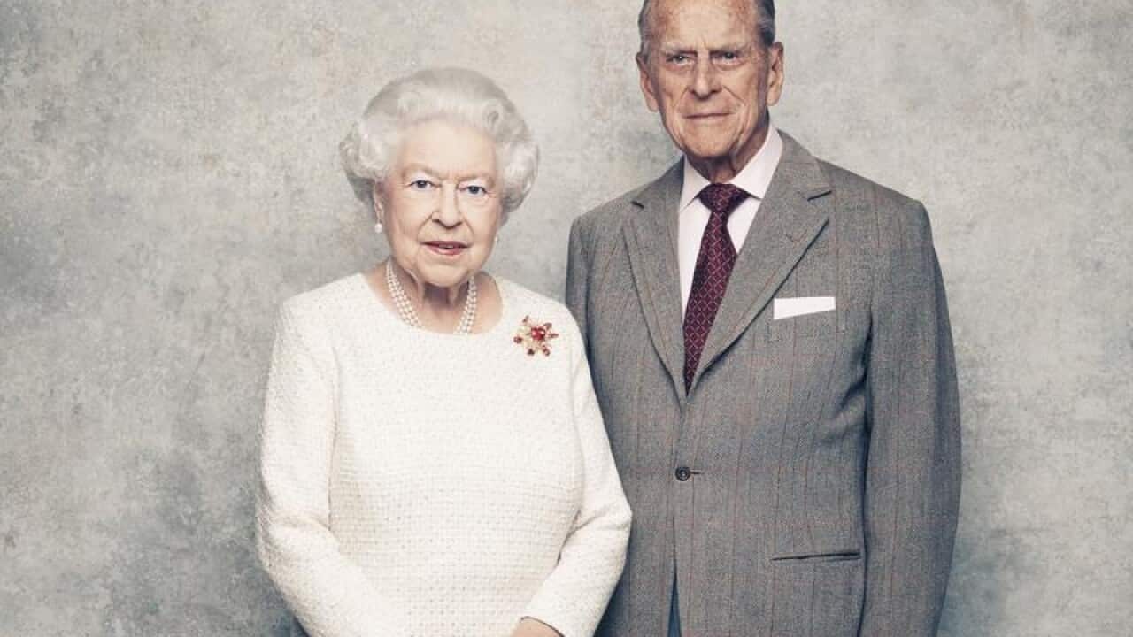 Queen Elizabeth and Prince Philip pose for a portrait