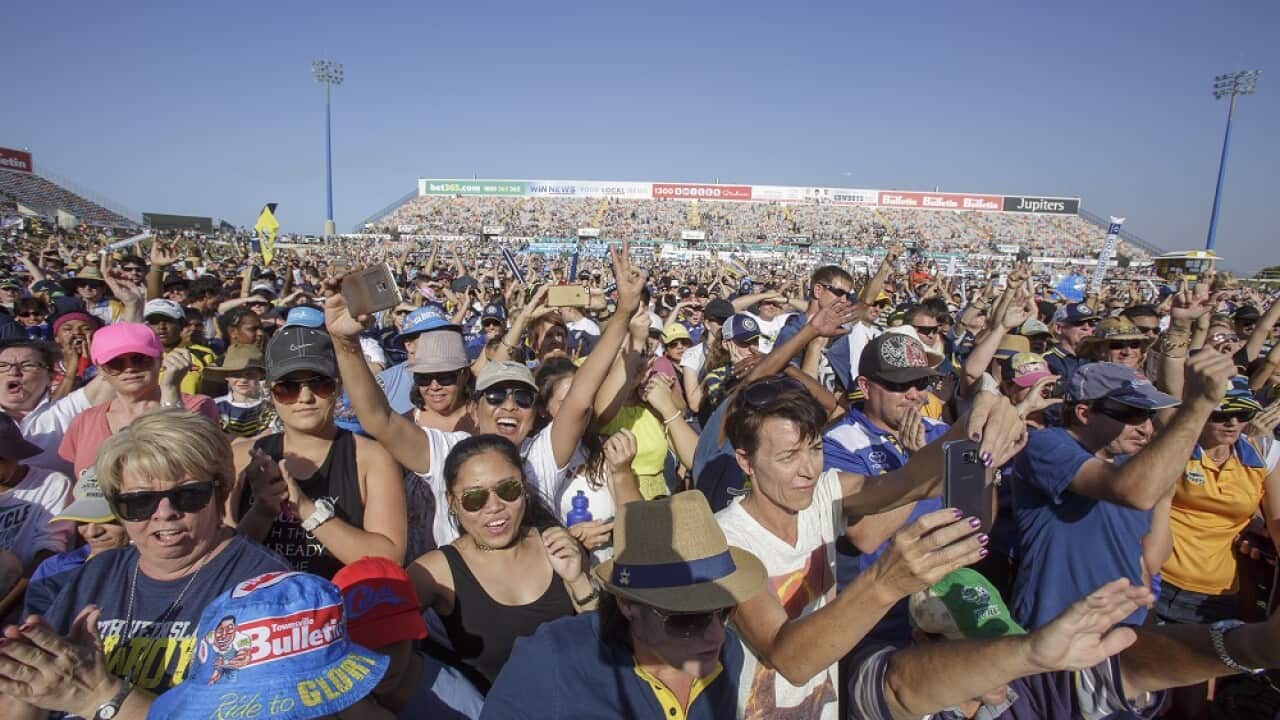 NRL premiership winners the North Queensland Cowboys appear before a crowd of fans in Townsville on Monday, Oct. 5, 2015. The Cowboys beat the Brisbane Broncos in the NRL Grand Final. (AAP Image/Andrew Rankin) NO ARCHIVING