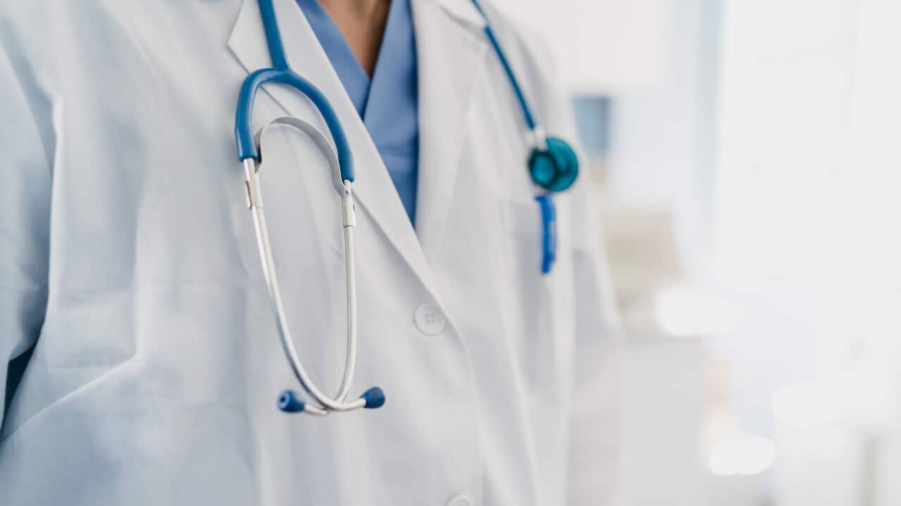 close-up of a doctor's gown with stethoscope