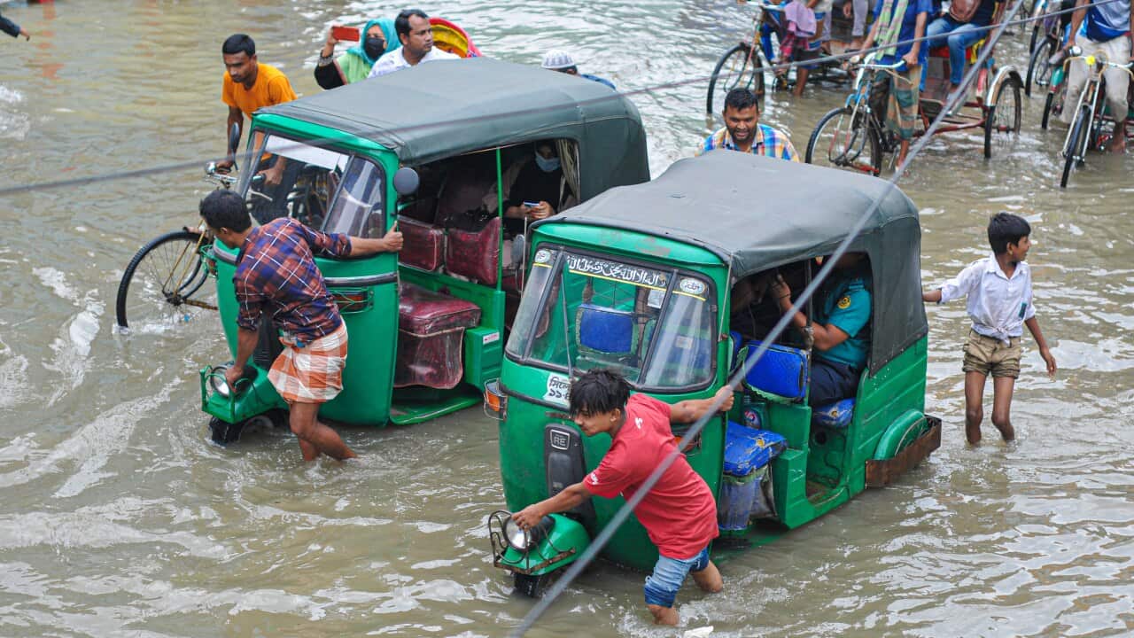 Vehicles Stuck in the floodwaters.