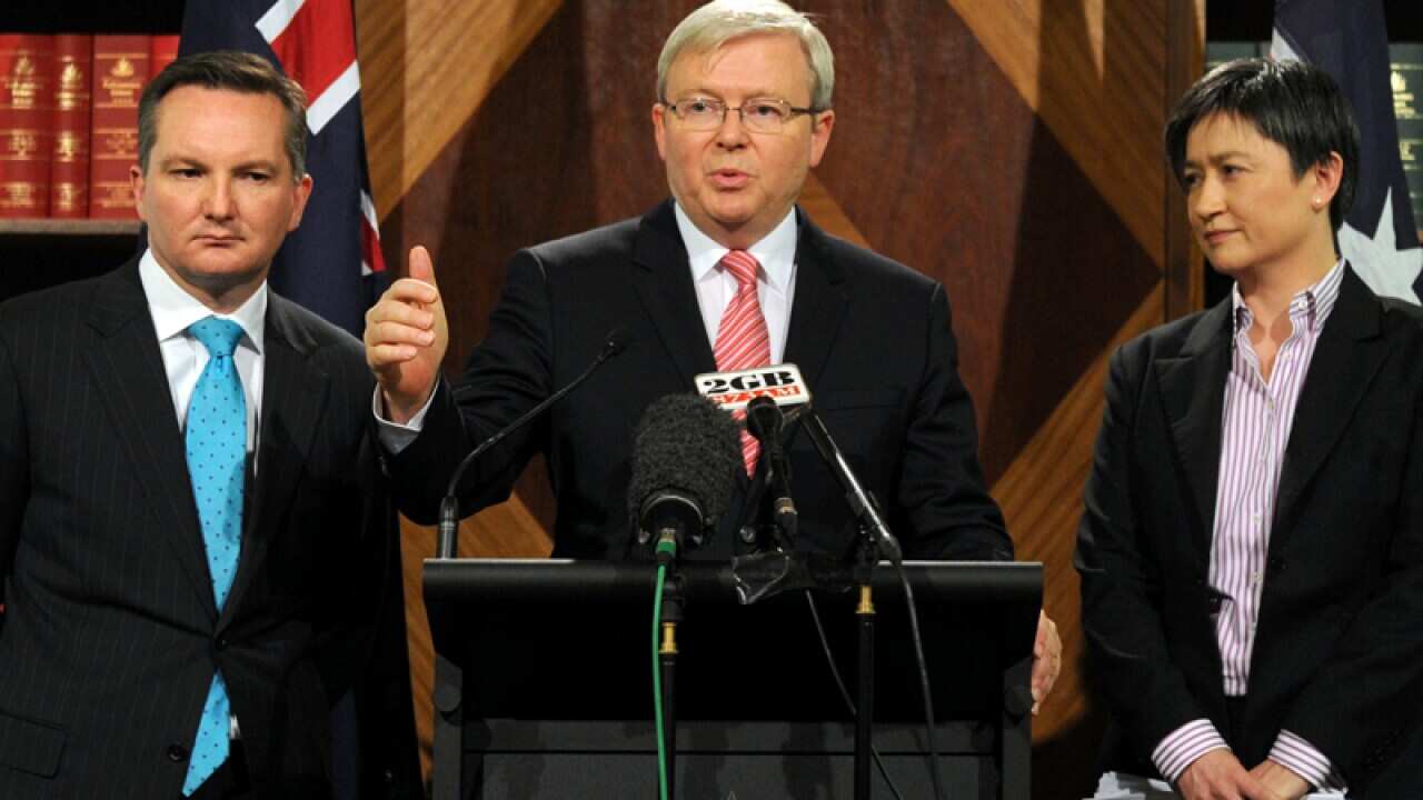 Kevin Rudd (C), Chris Bowen (L) and Penny Wong
