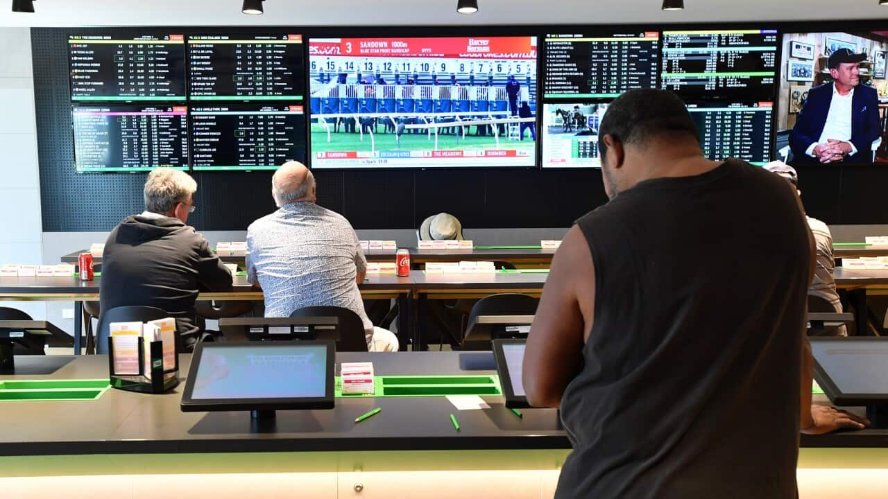 Customers at Tabcorp venue in Brisbane prior to the COVID-19 pandemic