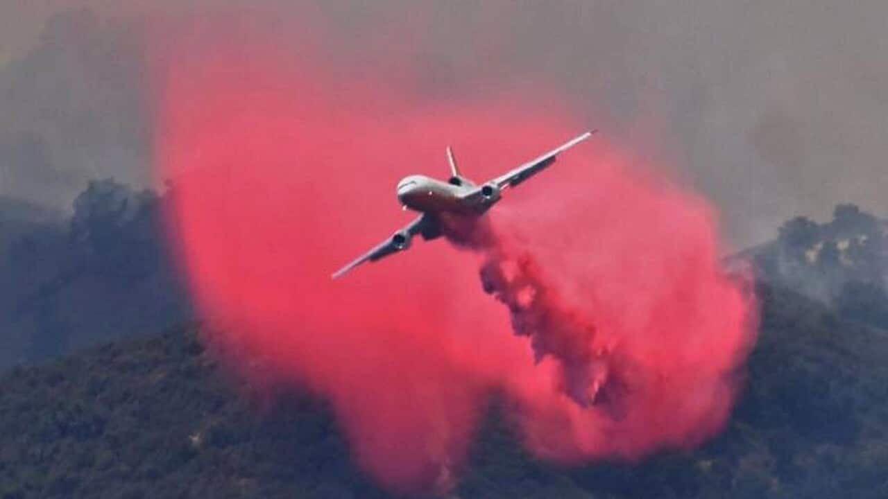 DC-10 making a fire retardant drop on a ridge line along the eastern flank of the Alamo Fire in Santa Barbara County, Calif.