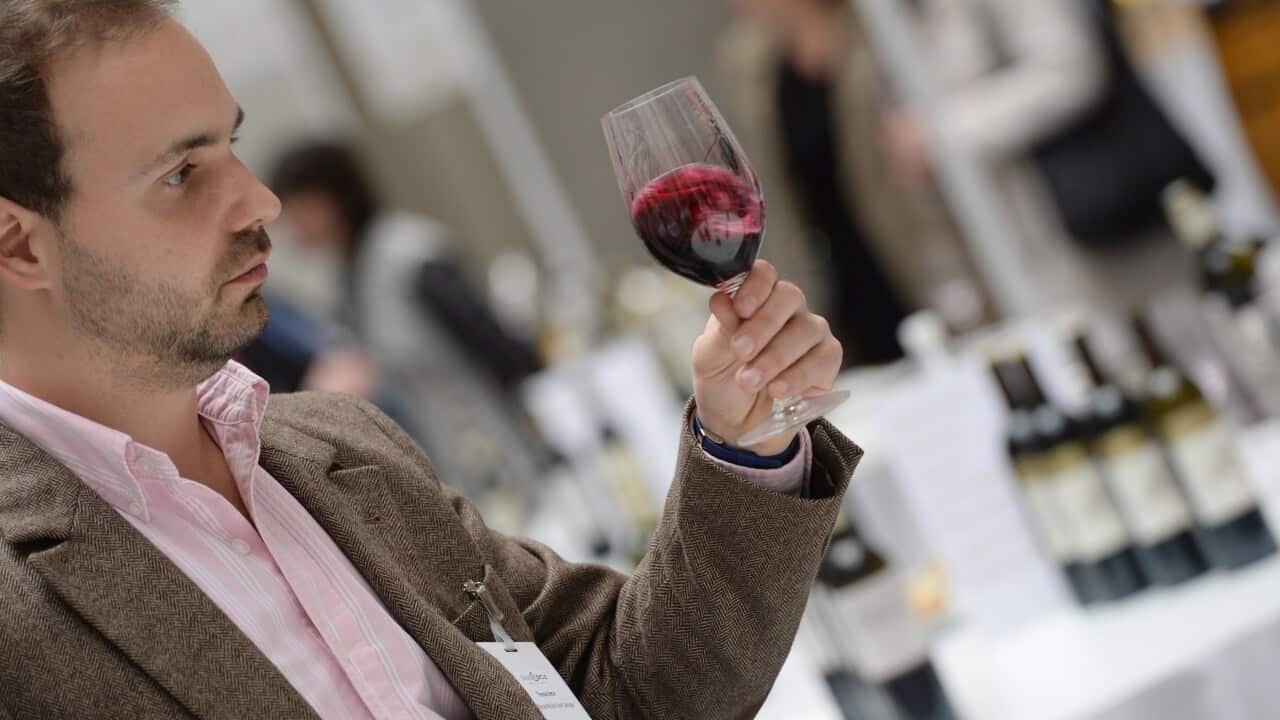 A man prepares to taste a 2013 vintage red wine at the Palais de la Bourse in Bordeaux (FIle: Getty)