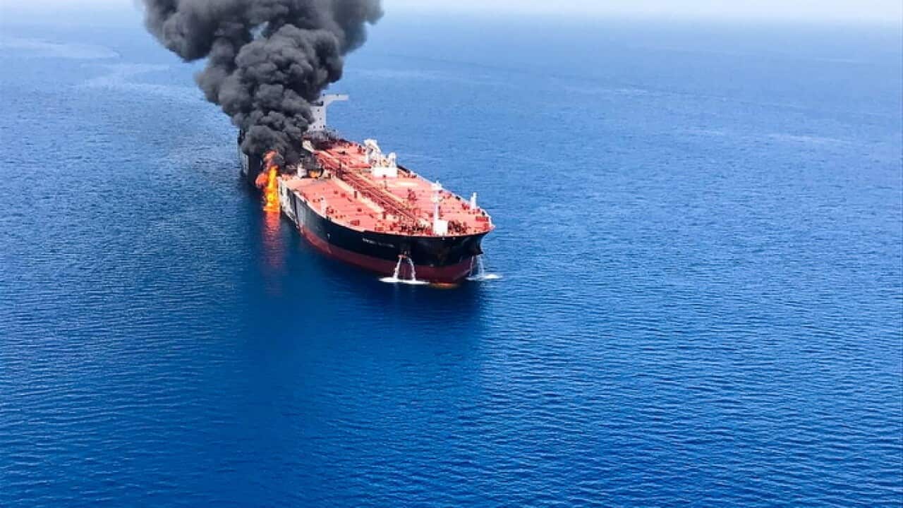 Crude oil tanker on fire in Gulf of Oman