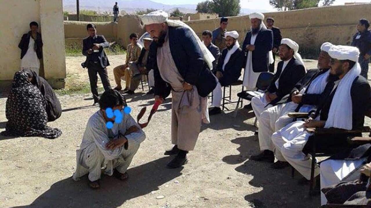 مراسم شلاق زنی طالبان.jpg