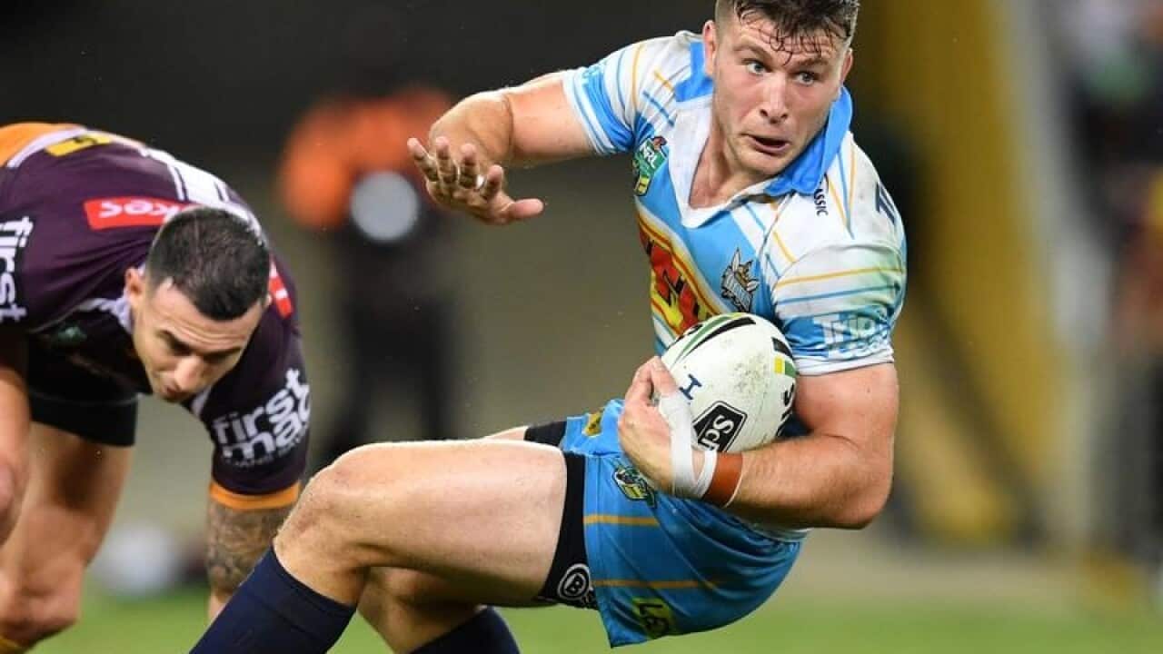 NRL player Jai Arrow of the Gold Coast Titans in action.