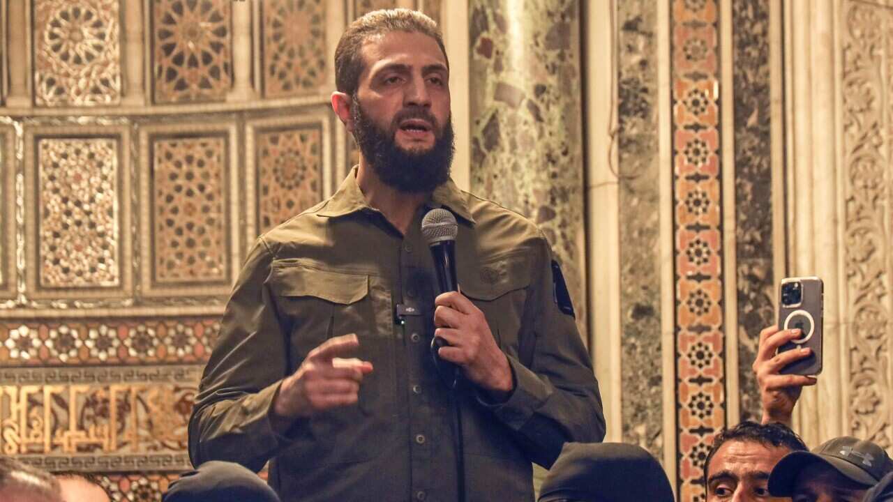 Abu Mohammed al-Golani speaks at the Umayyad Mosque in Damascus Sunday, Dec. 8, 2024.