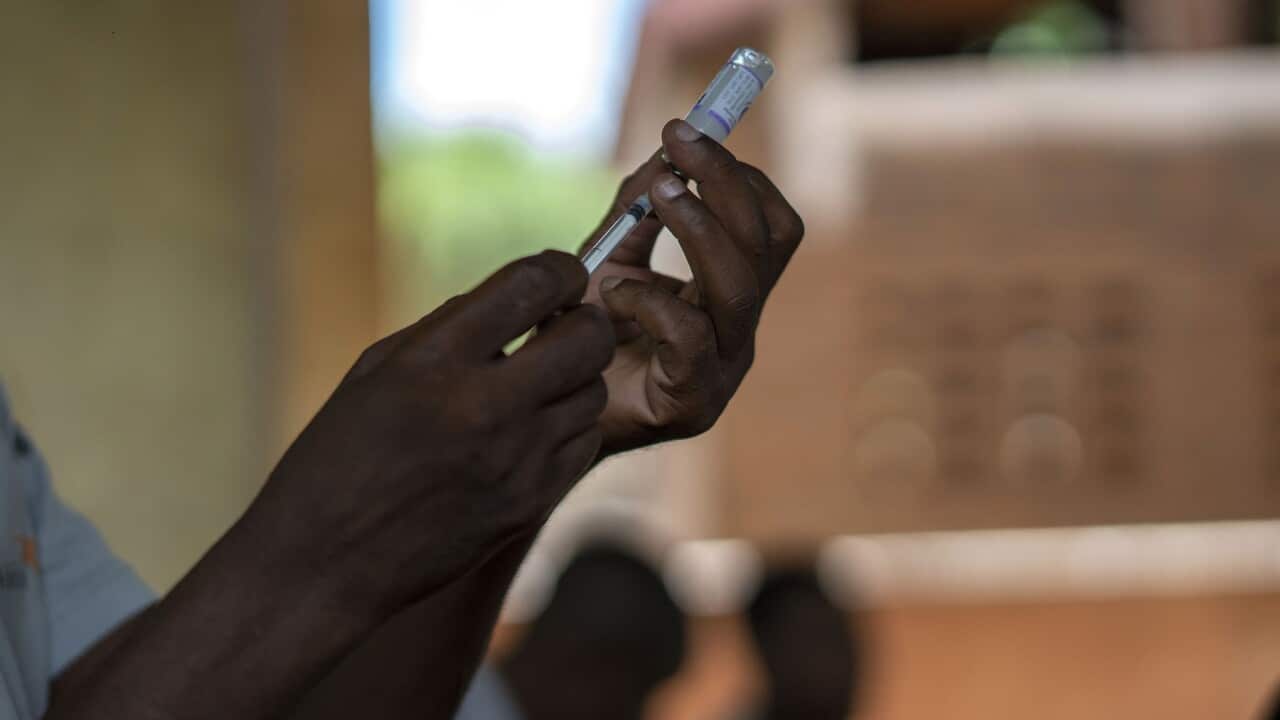 : Health officials prepare to vaccinate residents of Malawi against malaria (AAP).