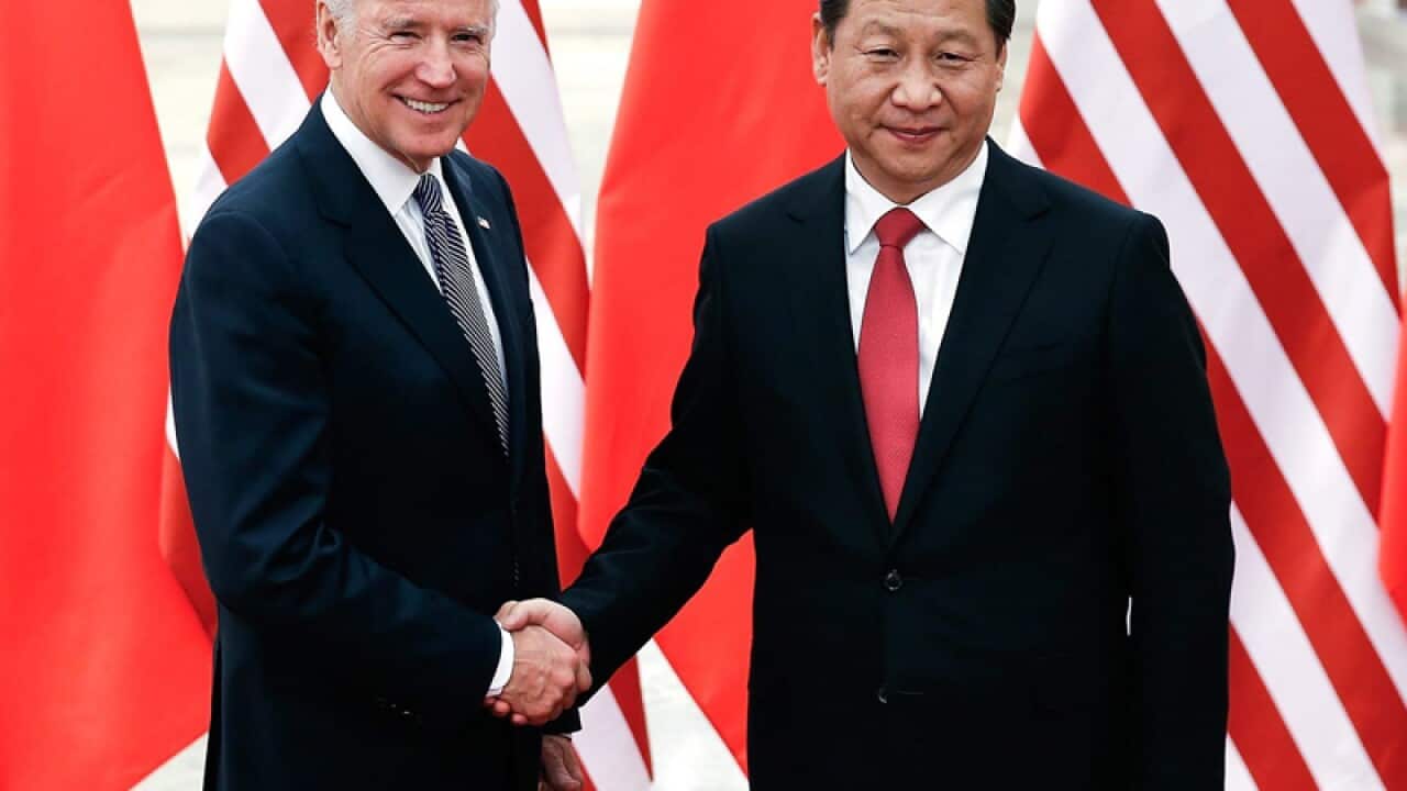 US Vice President Joe Biden (L) and Chinese President Xi Jinping