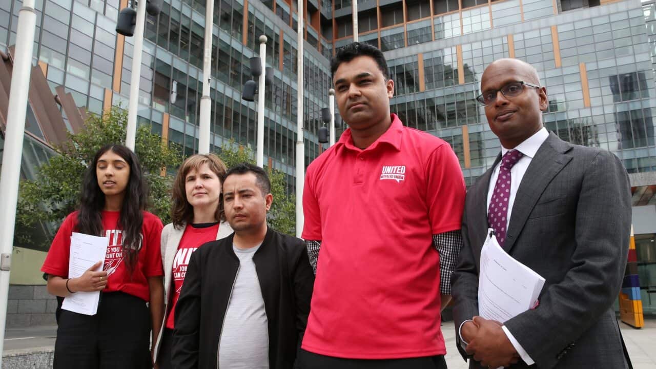 United Workers union and alleged underpaid staff outside the Federal Court in Melbourne