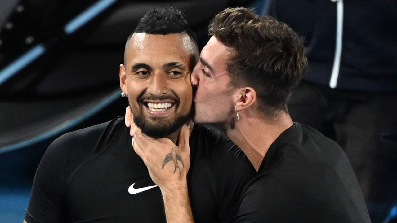Nick Kyrgios and Thanasi Kokkinakis celebrate after winning the Mens doubles final against Matthew Ebden and Max Purcell the Australian Open, January 29, 2022.