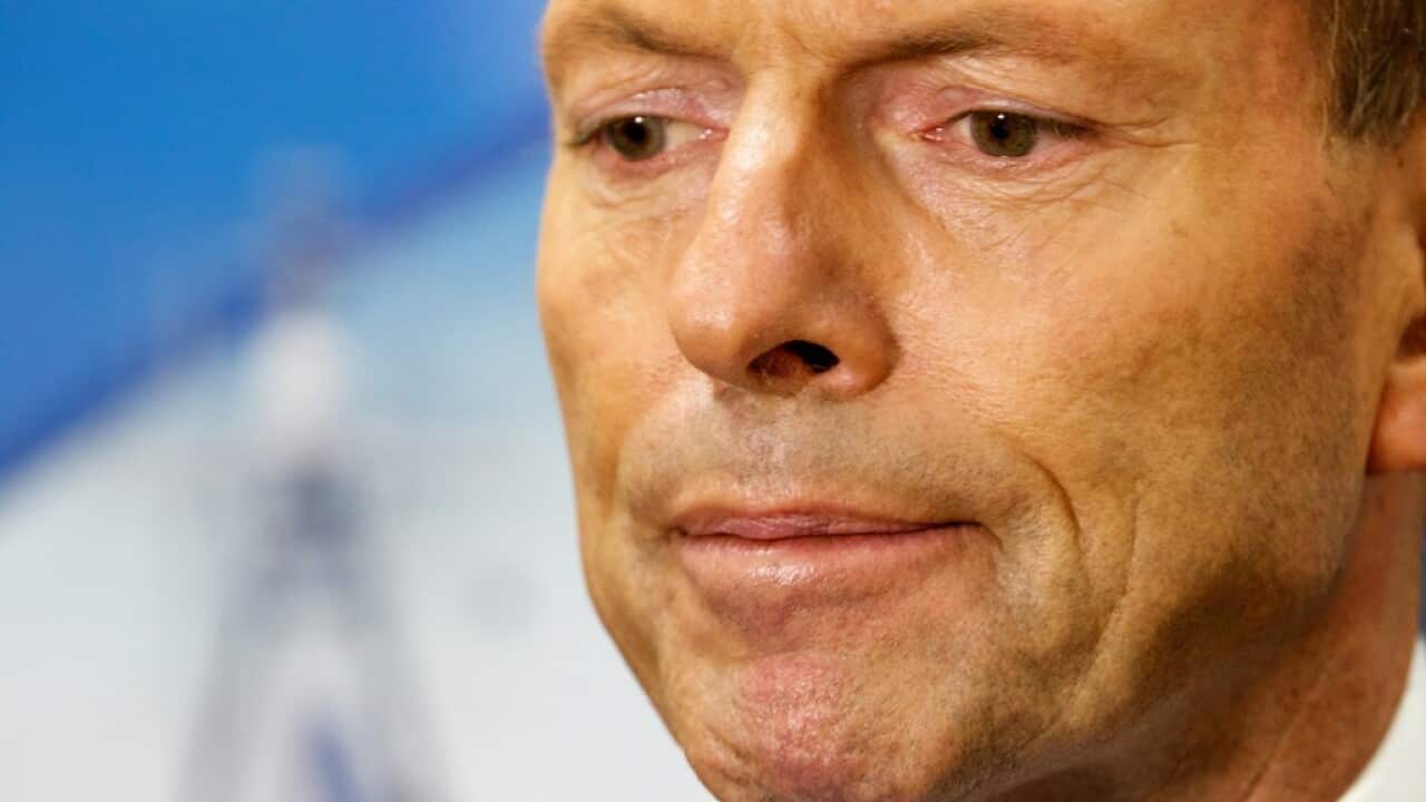 Australian Prime Minister Tony Abbott speaking at a press conference during a visit to the Austal Ship Yard in Henderson, Perth, Western Australia on Friday, August 21, 2015. (AAP Image/Richard Wainwright) NO ARCHIVING