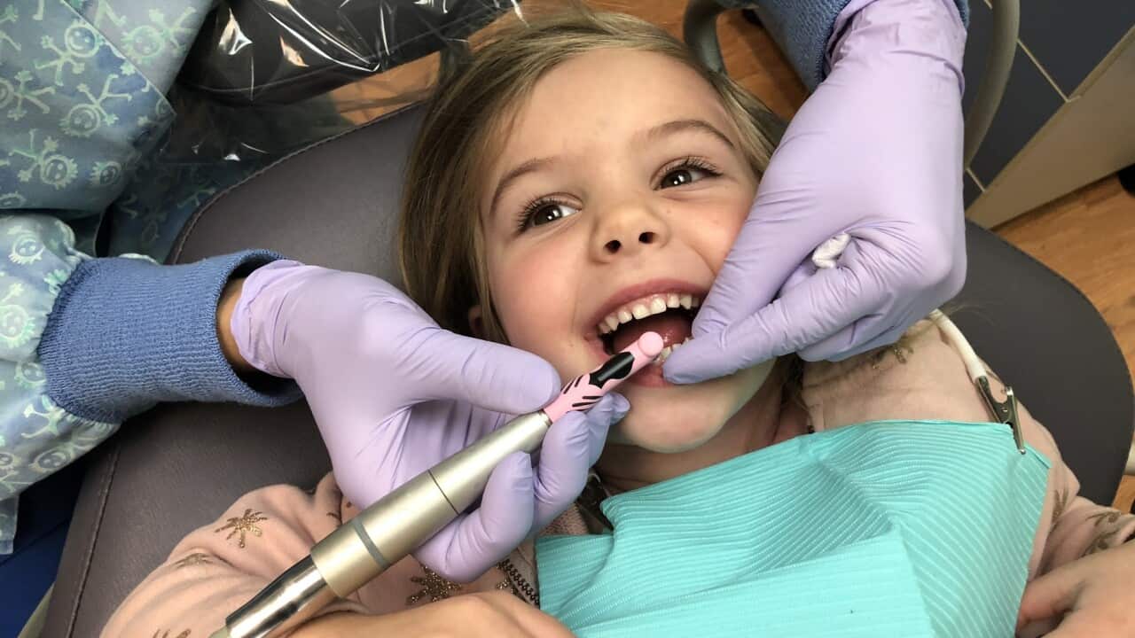 Little girl at the dentist