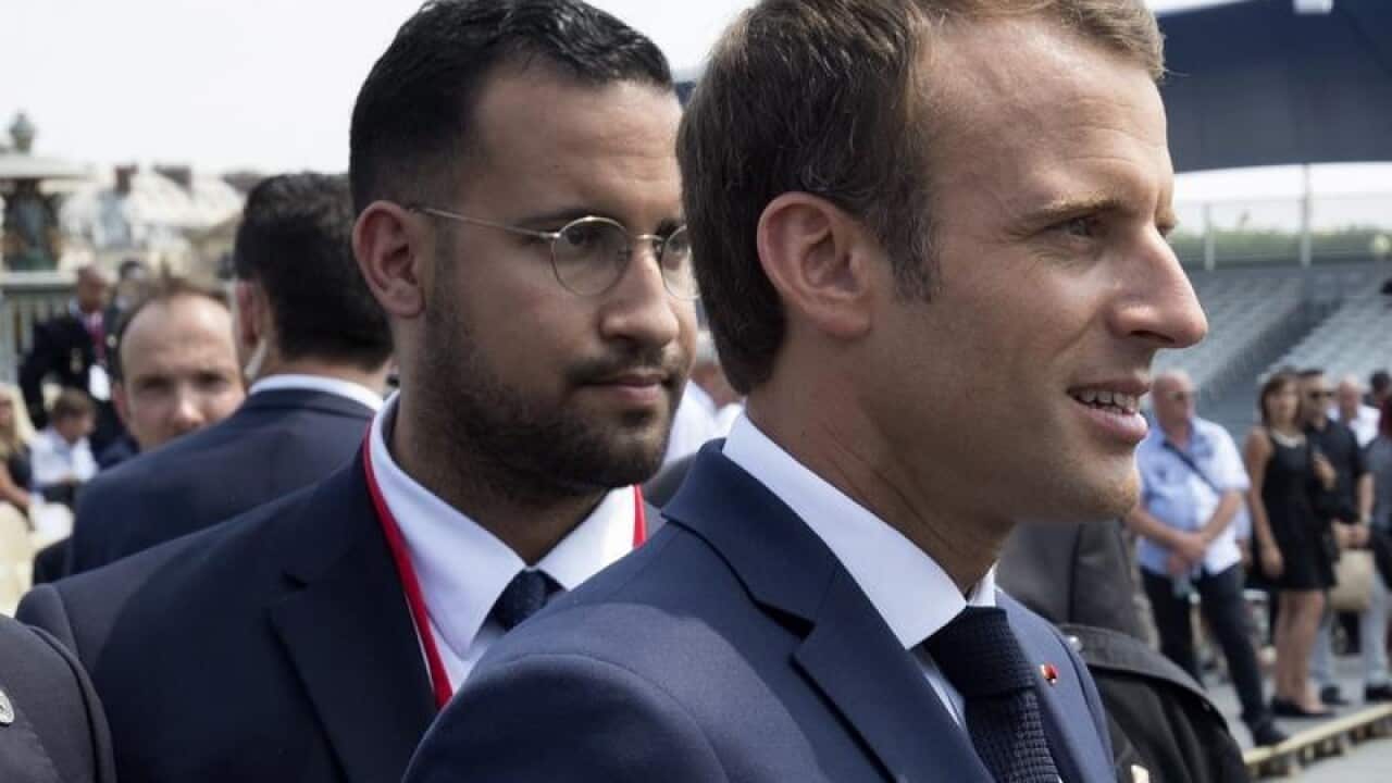 Alexandre Benalla and French President Emmanuel Macron.