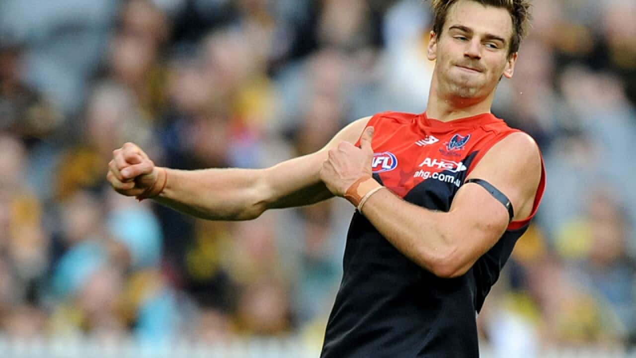 Dom Tyson of Melbourne celebrates after kicking a goal