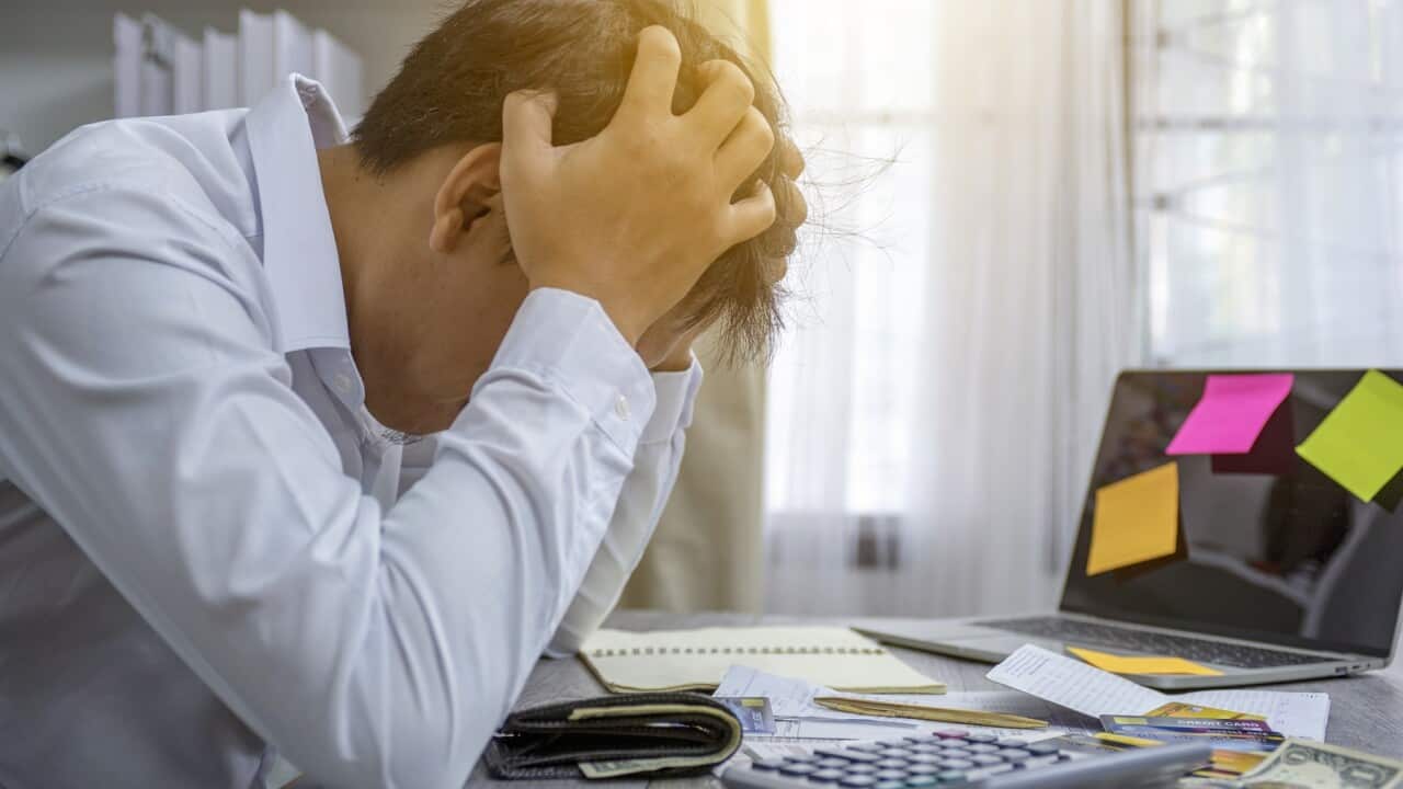 Business people stress the cost