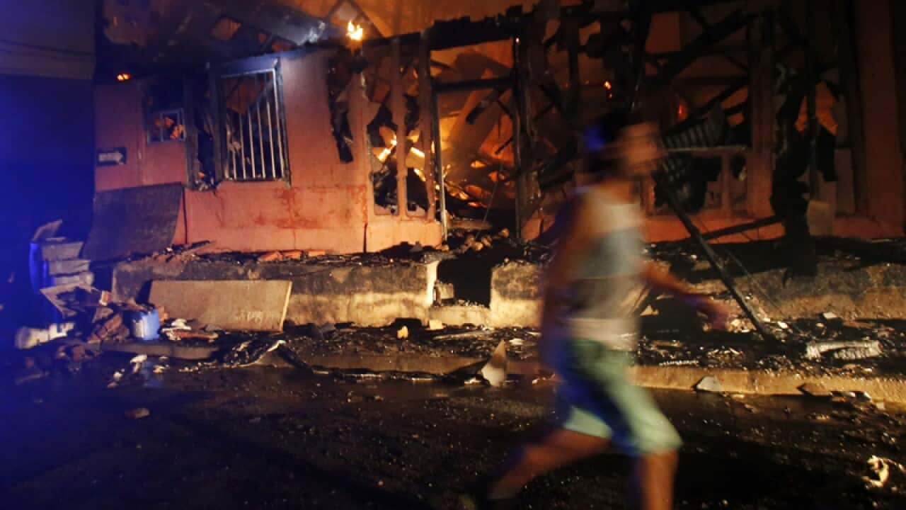 a burning house in the city of Valparaiso, Chile