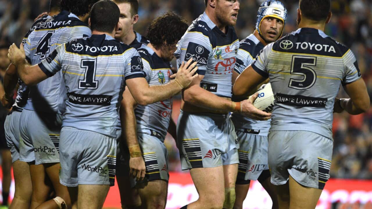 North Queensland players celebrate after scoring a goal