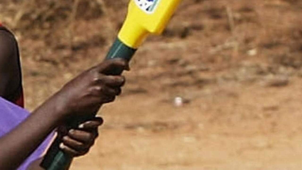 Steve Waugh of Australia teaches some locals about cricket