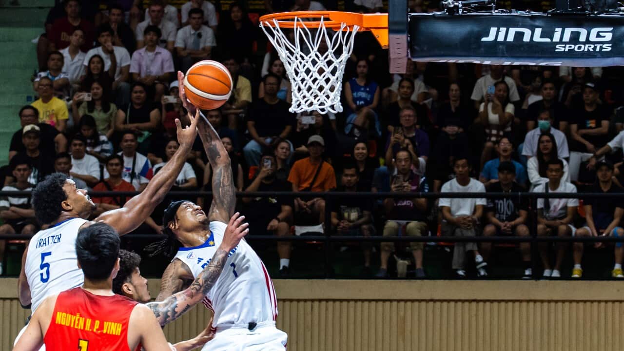 Abu Tratter #5 and Bobby Ray Parks #1 of Philippines seen in