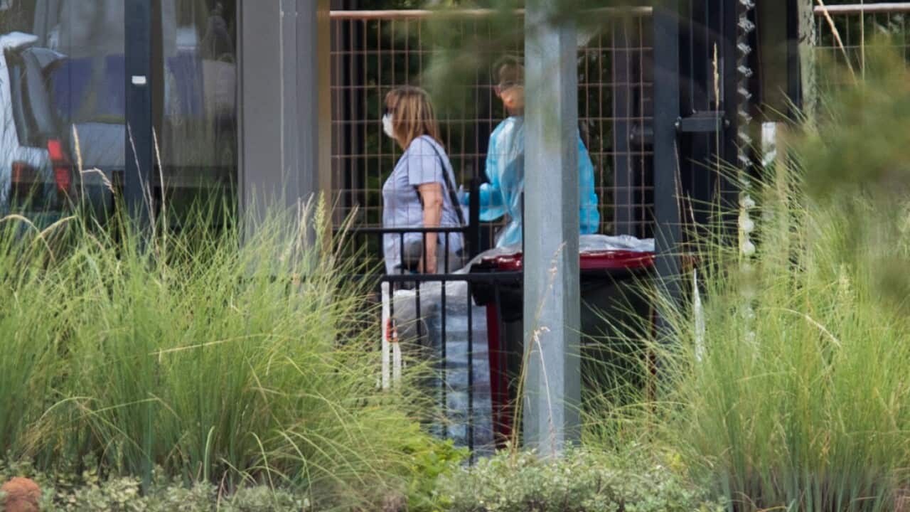 Australian evacuees, from the coronavirus-struck cruise ship Diamond Princess, are seen after arriving at the Inpex Plant Manigurr-ma Village at Howard Springs