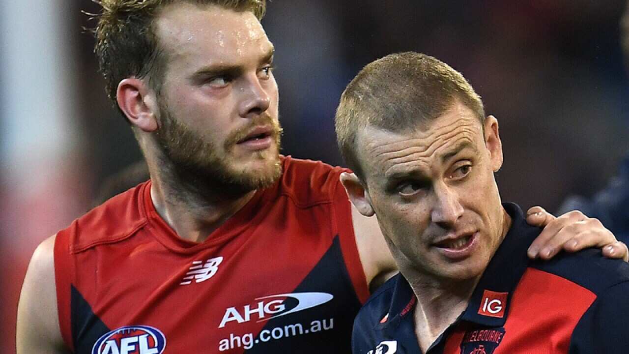 Jack Watts (L) and coach Simon Goodwin of the Demons