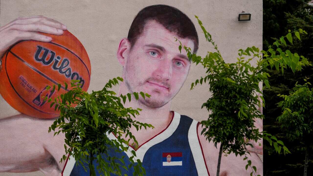 A mural showing Denver Nuggets center Nikola Jokic is seen on a wall in Belgrade, Serbia.