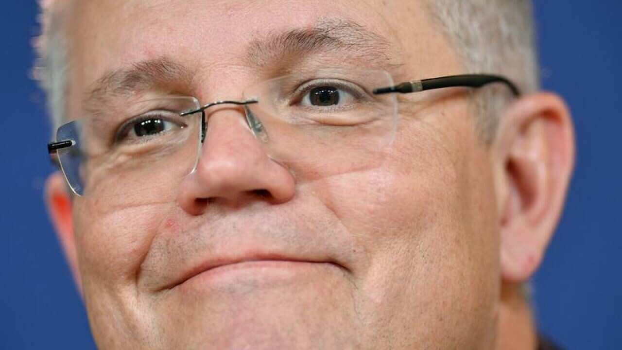 Treasurer Scott Morrison speaks to the media in Sydney