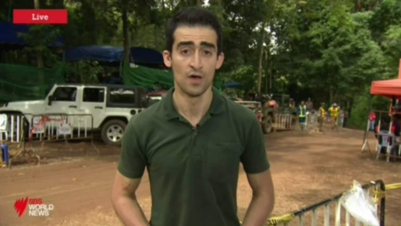 Omar Dabbage, SBS World News reporter, reporting from Tham Luang Cave, Thailand.