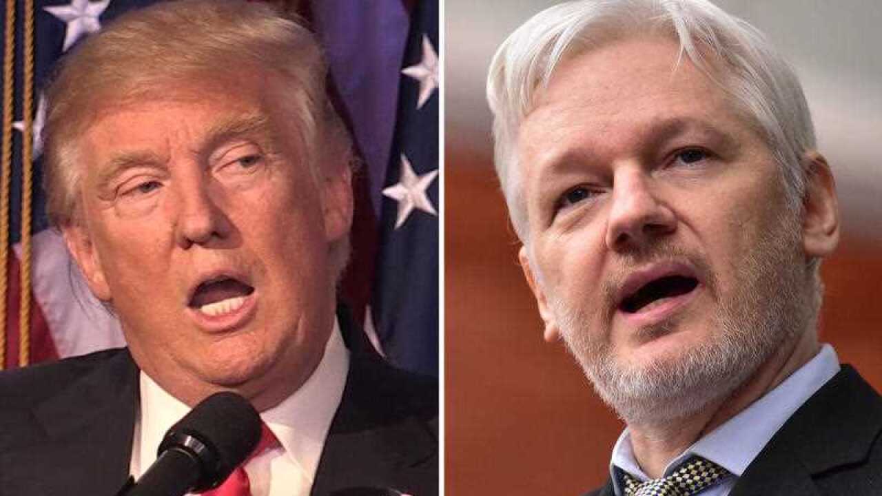 File photos of Donald Trump (left) and Julian Assange, as the WikiLeaks founder is leading the US President-elect in a poll to find Time magazine's person of the year.
