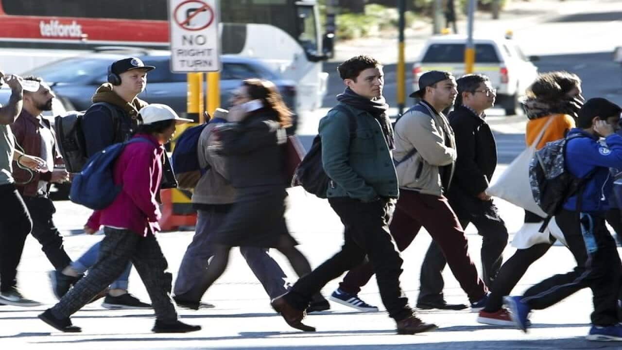 City commuters are seen in Sydney.