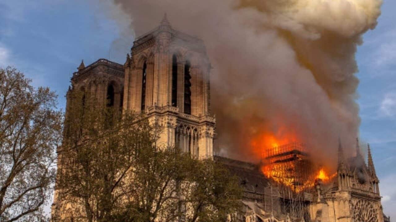 A photo taken on Monday April 15, 2019 shows Notre Dame cathedral burning in Paris (AAP)