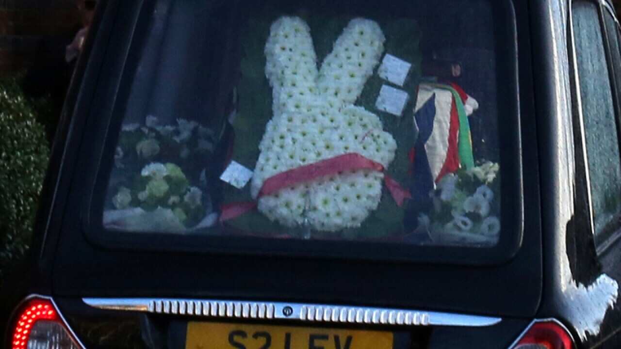The hearse carrying the coffin of Great Train Robber Ronnie Biggs