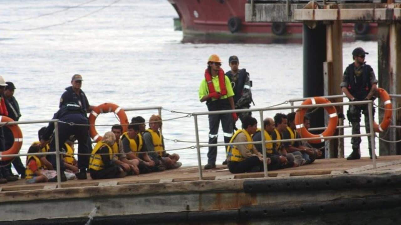 A boat carrying asylum seekers arrives at Christmas Island