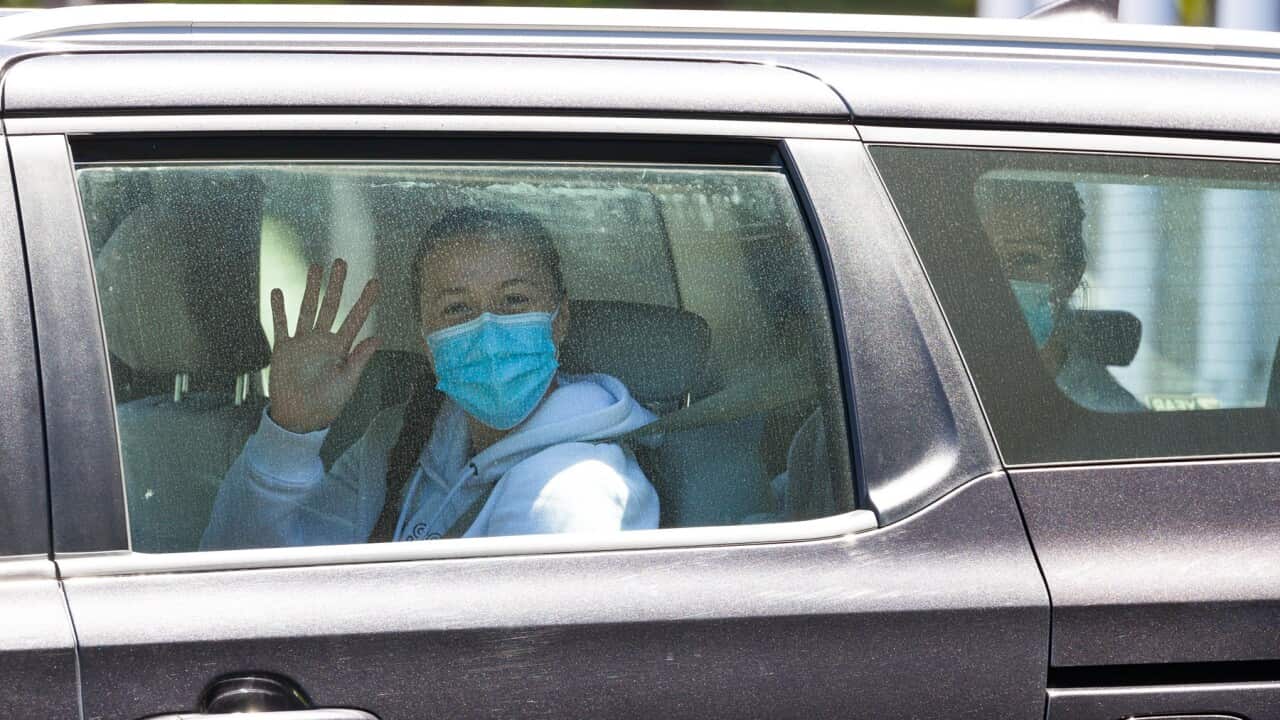 Ivana Popovic leaves her hotel for a practise tennis session