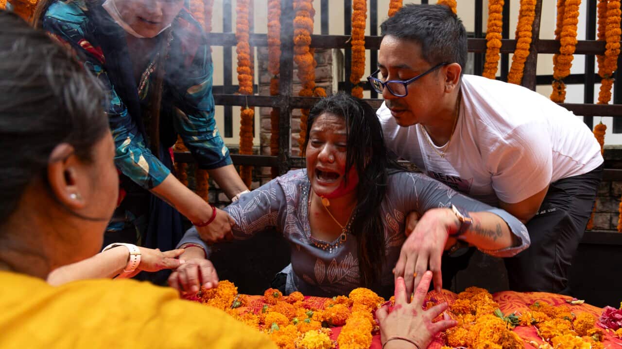 The mother of Rashik Khadiwoda, who was killed during the Gen-Z protest, breaks down in tears while paying her last respects in Kathmandu, Nepal, 16 September 2025. Rashik was killed during the Gen-Z protest on 08 September 2025.