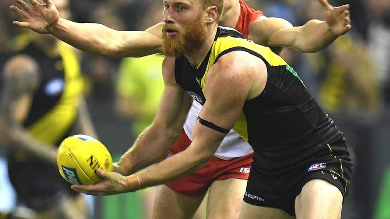 Nick Vlastuin of the Tigers is seen in action