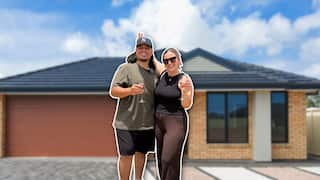 Patricia Nicula and her partner Tai in front of a house